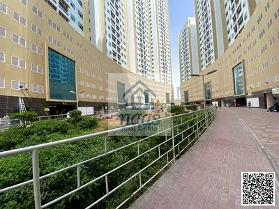 شقة بغرفة نوم واحدة وصالة مع موقف سيارات للبيع في برج لؤلؤة عجمان، وسط مدينة عجمان