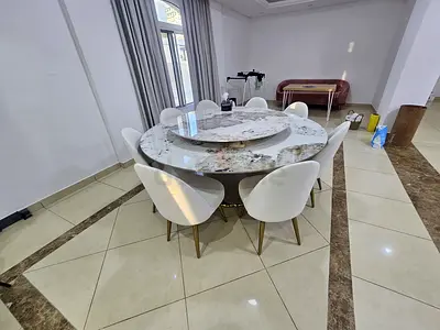 Great Condition Pan home dining table with 8 chairs for sale marble