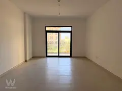 Bright Unfurnished Apartment with Community View