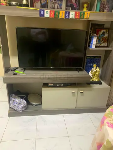 Used 49-inch LED TV in good working condition with stand smart tv