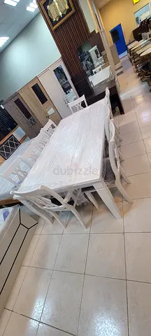 White Wooden Dining Table with 810Chairs - Good Condition