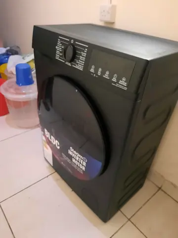 Modern Black Front Load Washing Machine with Steam Inverter Motor -Deira dubai