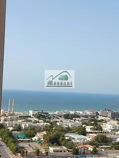 BIG SIZE 1BHK SEA VIEW WITH BUILTIN CABOARD +CAR PARKings IN AJMAN ONE 5MIN WALK TO AJMAN BEACH