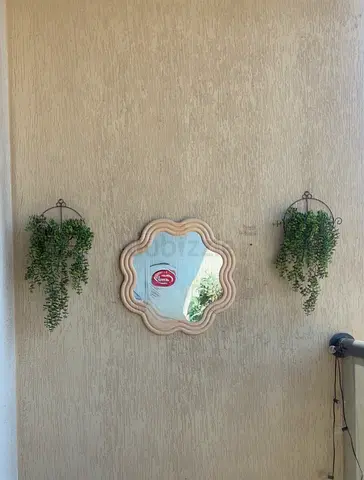Decorative scalloped wall mirror - light wood finish