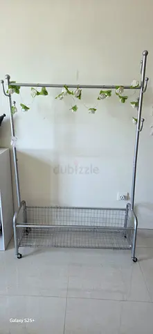 Metal freestanding clothes rack with wire shelf - good condition