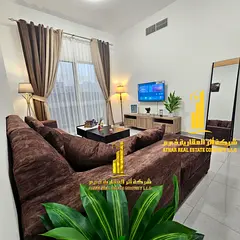 Luxurious two-bedroom apartment with new furniture for monthly rent in Ajman - Corniche - behind the