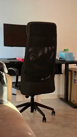 Black ergonomic mesh office chair with lumbar support