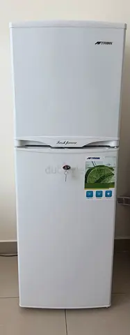 Compact white Atinor top-freezer refrigerator - perfect condition. 137 cm tall
