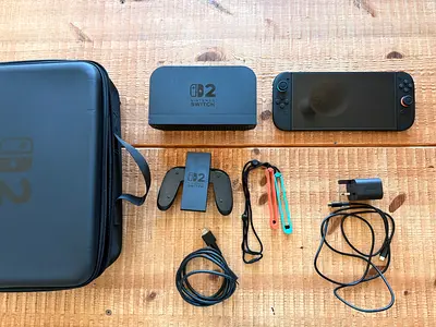 Nintendo Switch 2 with accessories (dock, Joy-Con grip, cables)