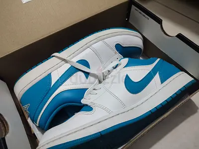 White and Blue Nike-style Low Top Sneakers, lightly used, size unknown