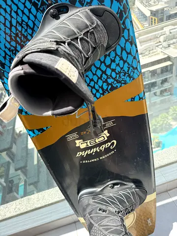 Used wakeboard with adjustable boots/bindings — good condition