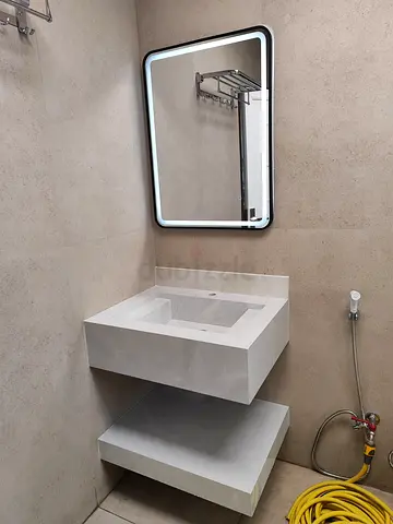 Wall-mounted floating bathroom sink with shelf and LED mirror