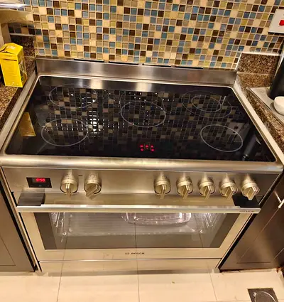 Bosch Stainless Steel Electric Ceramic Cooker with Oven - Good Condition