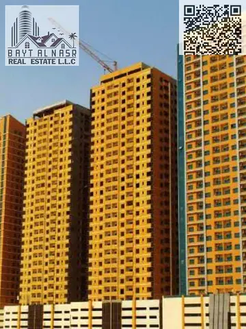 Spacious Two bedroom hall apartment with covered car parking available for SALE in Paradise Lake Towers Emirates City Ajman