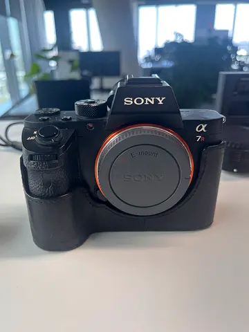 Sony Alpha a7Rii mirrorless camera body (no lens) with grip case, cage, 7 battery and Timelapse