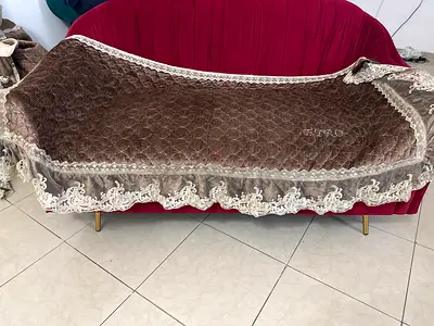 Decorative sofa cover with lace trim