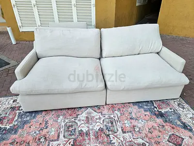 Home Center swin feather filled sofa