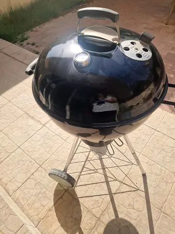 Weber Master charcoal grill (used) - good condition, includes cover, accesories