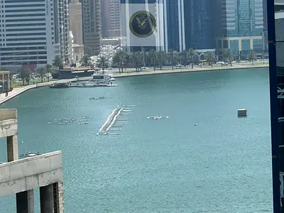 Spacious one bedroom and living room apartment with sea view for annual rent in Al Majaz 1 free AC from owner built in wardrobes near Al Noor Mosque