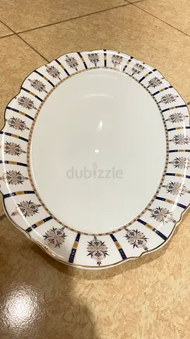 Three plates, fifteen bowls