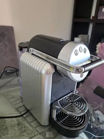 Used pod coffee machine (Nespresso-style) in good working condition professional Origrnal price 1650