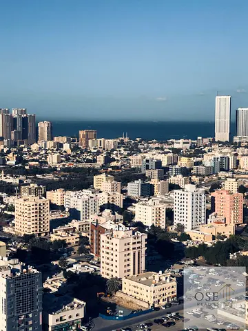 One-bedroom apartment with living room in Al Waha Towers with parking