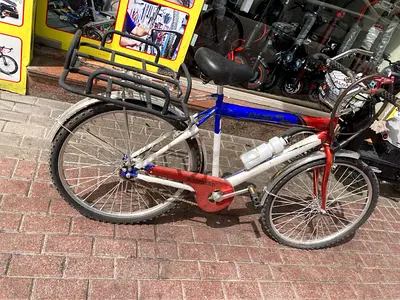Used adult city/commuter bicycle with rear carrier