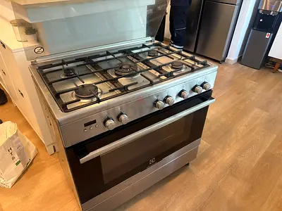 Used Electrolux Stainless Steel 5-Burner Gas Cooker with Oven - Good Condition