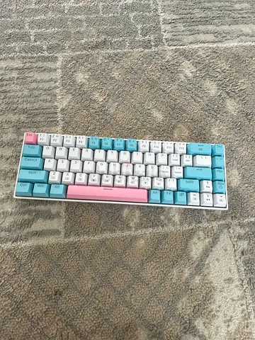 Keyboard blue and white and pink 150dhs only works perfectly fine no problems blue switches