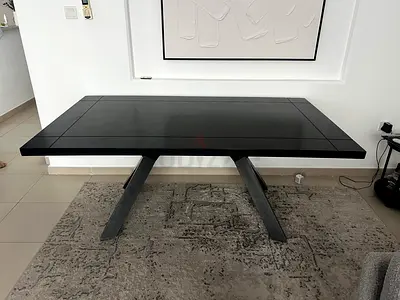 Used black wooden dining table - solid surface, some scratches