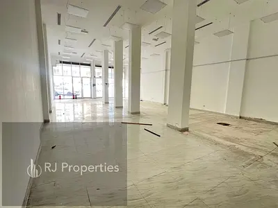 VERY PRIME LOCATION LUXURY HUGE SIZE SHOP WITH WASHROOM FRONT MAIN ROAD READY TO MOVE JUST 215K