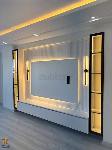 Modern Built-in TV Wall Unit with LED Lighting and Display Cabinets