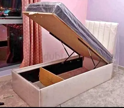 Single storage bed with gas-lift mattress base - light beige