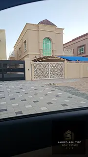 Villa for annual rent in Ajman, Al Mowaihat. 5 master rooms, 2 halls, majlis, kitchen, maid’s room