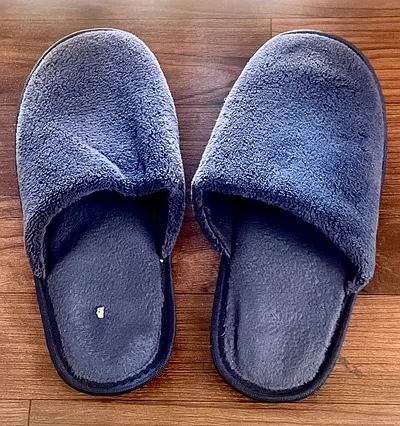 Comfortable grey indoor fuzzy slippers (used, size not marked)