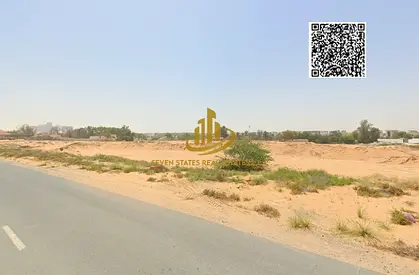 فرصة استثمارية بسعر لقطة -الحليو 2 عجمان قطعه ارض سكنيه تاون هاوس ارضى و طابقين شارع قار موقع جيد
