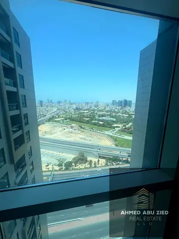 For annual rent: 2 fully furnished bedrooms and a living room in City Tower, 2 bathrooms, a balcony, and a closed kitchen with excellent furniture for