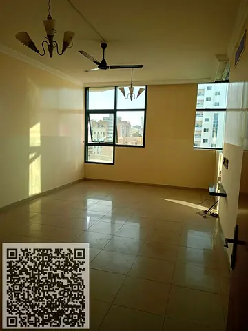 Two-bedroom apartment with a living room for annual rent in Al Rashidiya Towers, Ajman. Spacious area. Special discount for cash payment.