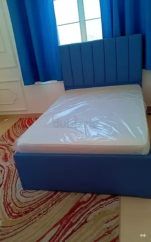 Double 120x190 blue upholstered bed with new mattress