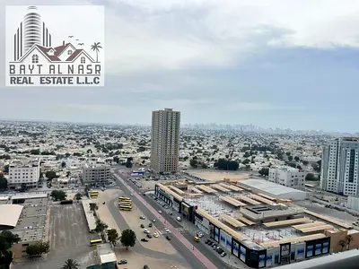 STUNNING SHARJAH VIEW FROM 1BHK BALCONY FULL FURNISHED APARTMENT WITH PARKING ON MONTHLY BASIS IN CITY TOWERS