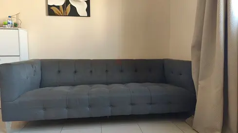 Grey tufted 3-seater sofa - good condition