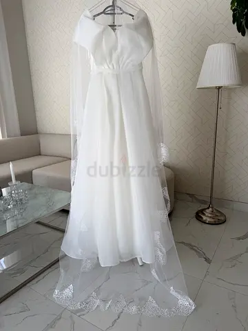 Brand New Wedding Dress with Veil – AED 3,500