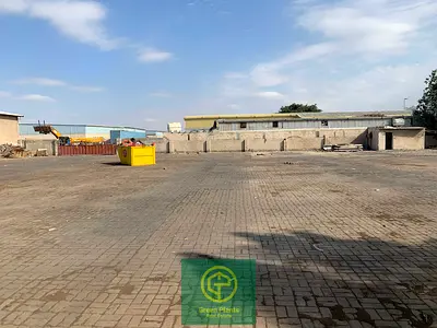 Al Quoz Industrial Area 22,000 sq. Ft open yard with built-in open shed in a prime location | Road Facing