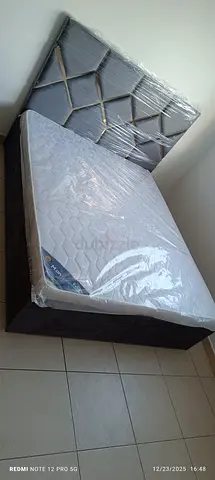 Queen size storage bed including madical mattres brand new selling