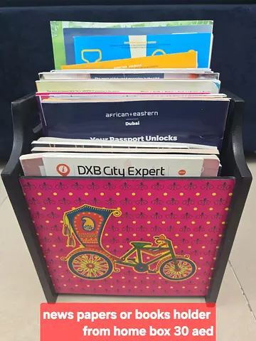 Newspaper or book holder