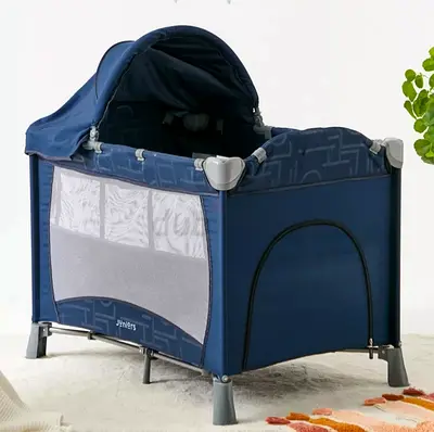 Portable navy blue travel playard/pack n play with canopy