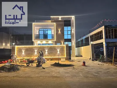 امتلك فيلا للبيع في قلب الحليو2 عجمان _شامل رسوم التسجيل والتملك _بها مسبح كبير _ بجانب جميع الخدمات_ علي الشارع الرئيسي _ سهل المخرج الي دبي والشارقه