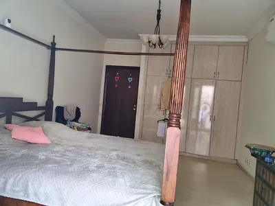 Wooden Four-Poster King Size Bed with one dresser