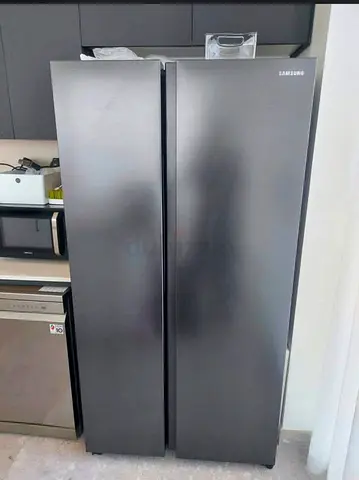 Samsung side by side refrigerator neat and clean excellent condition perfect working