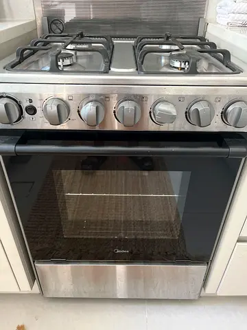 Stainless Steel Gas Range with Oven - Good Working Condition